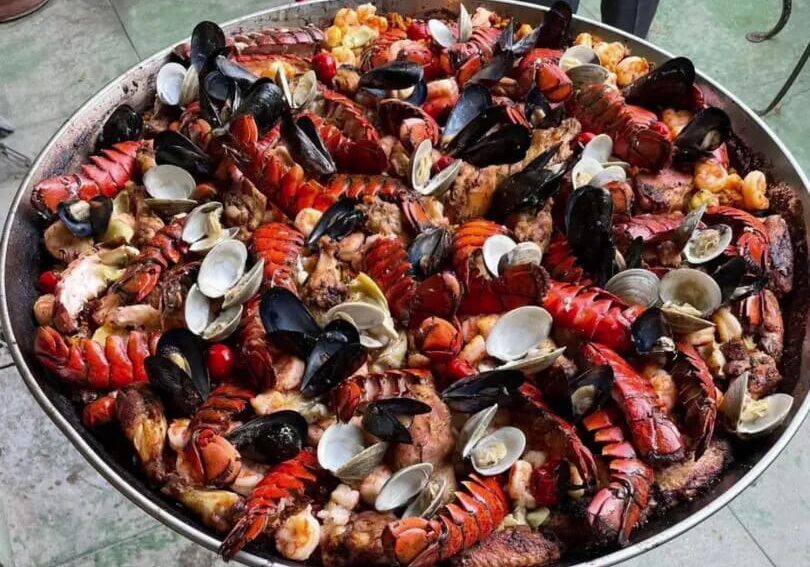 Seafood paella with lobster and mussels.